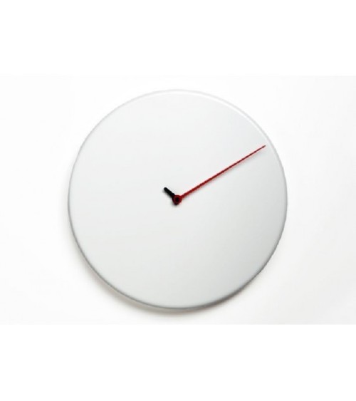 Designed by Alberto Sala, Less was born from the desire to rationalize the clock down to its purest form. The project reduces ev